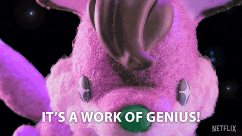 a pink stuffed animal with the words " it 's a work of genius " below it