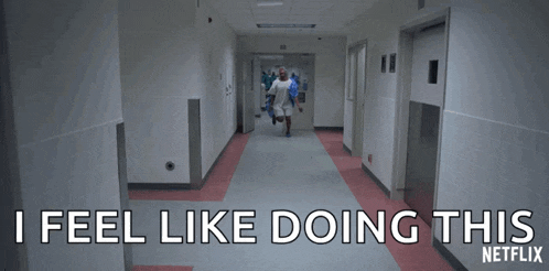 a nurse walking down a hospital hallway with the words i feel like doing this netflix