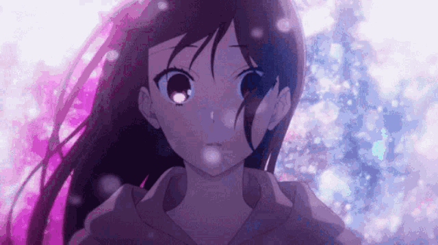 a close up of a girl 's face with a pink background