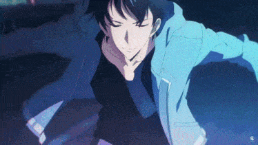 a man in a blue jacket and black shirt is dancing in the dark
