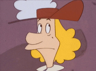 a cartoon character with blonde hair and a red hat is running