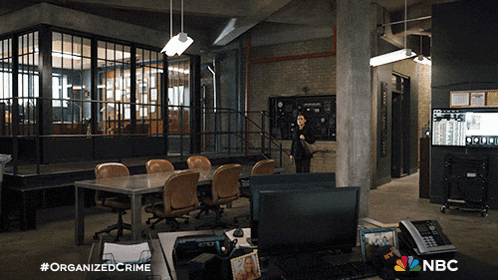 a nbc ad for organized crime shows a woman talking on the phone