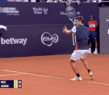 a tennis match is being played in front of a wall that says ' betway ' on it