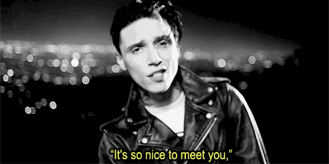 a black and white photo of a man in a leather jacket saying it 's so nice to meet you