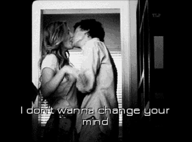 a black and white photo of a man and woman kissing with the words i don t wanna change your mind below them