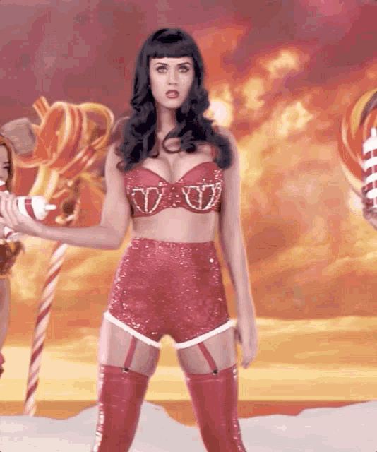 a woman in a red bra and shorts with hearts on it