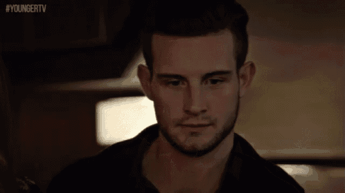 a close up of a man 's face with the hashtag #youngertv on the bottom