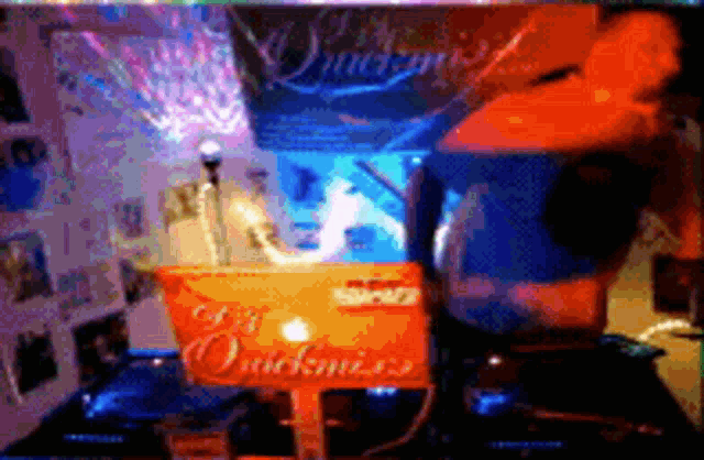 an orange sign that says quickmix sits on a table