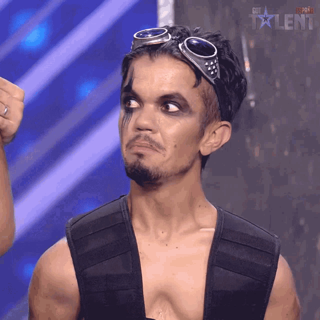 a man with a goggles on his head is on a screen that says got talent