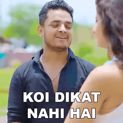 a man talking to a woman with the words koi dikat nahi hai written on the screen