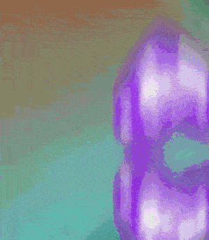 a close up of a purple and orange colored item