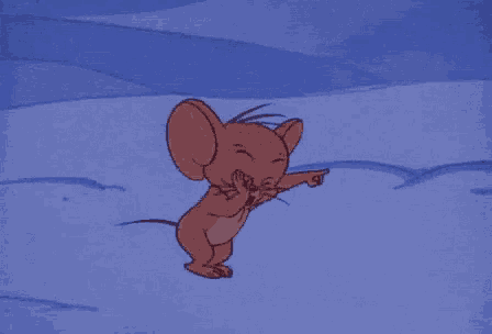jerry from tom and jerry is pointing at something in the distance