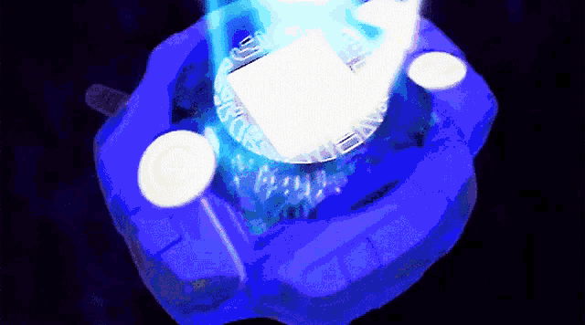 a blue object with a white light coming out of the center