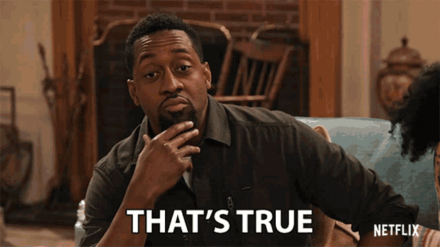 a man sitting on a couch says that 's true netflix