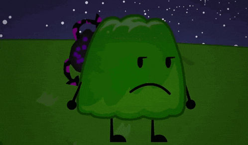 a green cartoon character with arms and legs is standing in a grassy field