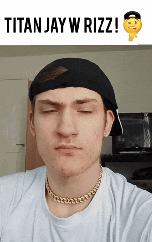 a man wearing a black hat and a gold chain has the words titan jay w rizz written above him