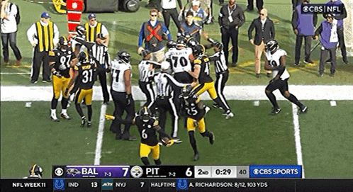 a cbs sports broadcast of a football game between pittsburgh and baltimore