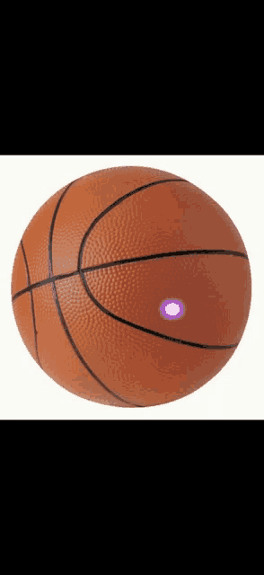 a basketball with a purple light on the center