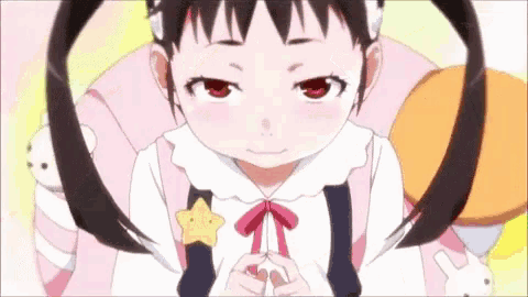 a close up of a girl with red eyes and a star on her shoulder