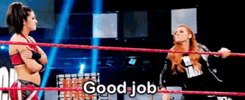 two women wrestling in a ring with the words good job written on the bottom