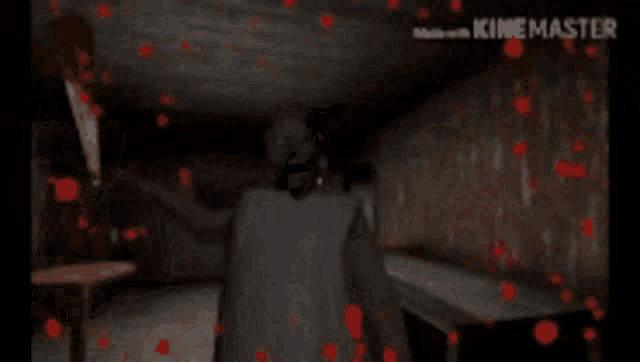 a person is standing in a dark room with blood coming out of the floor .