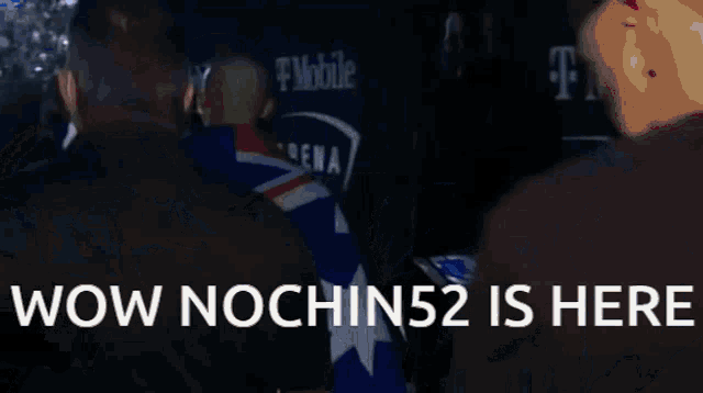 a bald man holding an australian flag with the words wow nochin52 is here behind him