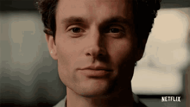 a close up of a man 's face with the word netflix on the bottom