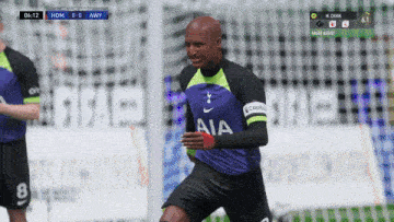 a soccer player wearing a jersey that says aia on the front