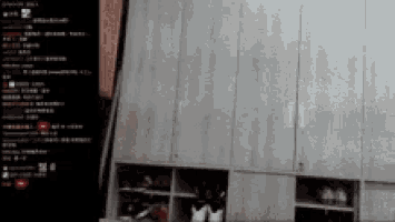 a blurred image of a room with a lot of shelves
