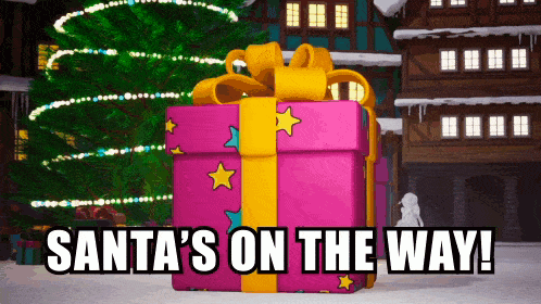 santa 's on the way written next to a gift