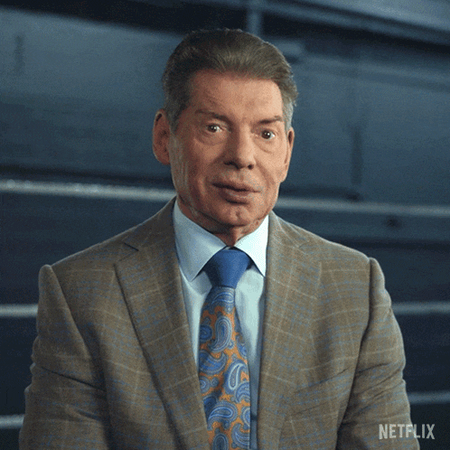 a man in a suit and tie with the word no on his face