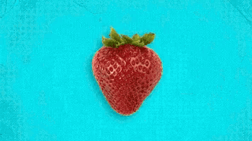 a strawberry is surrounded by lemon slices and grapefruit slices on a blue background