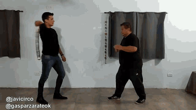 two men are dancing in a room with the words @javicirco @gasparzarateok at the bottom