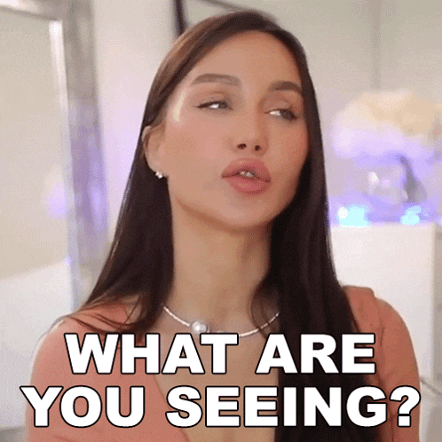 a woman with long hair is asking what are you seeing .