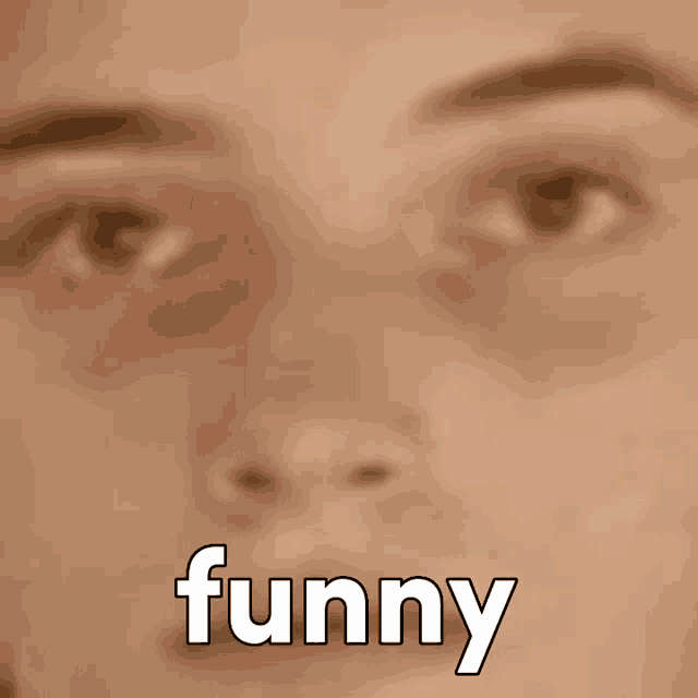 a close up of a person 's face with the word funny written on it
