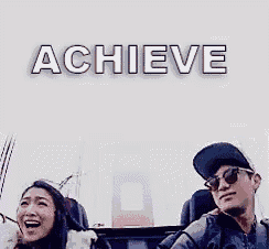 a man and a woman are riding a roller coaster and the word achieve is above them