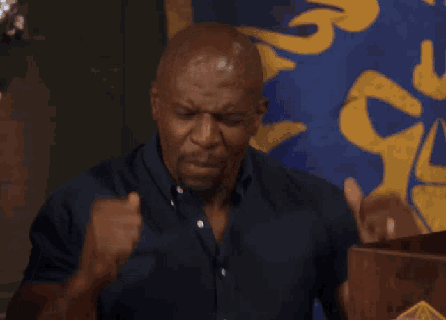 a man is giving a thumbs up in front of a podium that says mortal strike on it