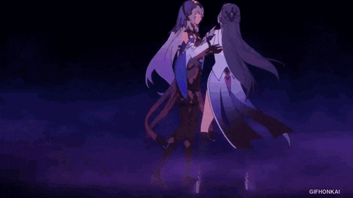 a couple of anime girls are dancing together on a stage .