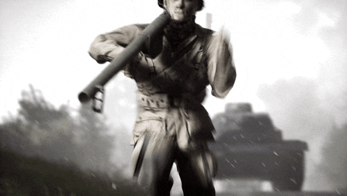 a black and white photo of a soldier with a rocket launcher