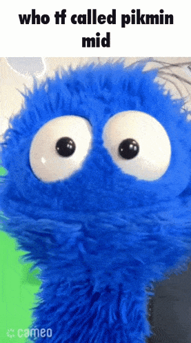 a blue stuffed animal with big white eyes and the words who tf called pikmin mid