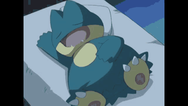 a cartoon character is laying on a bed with his mouth open