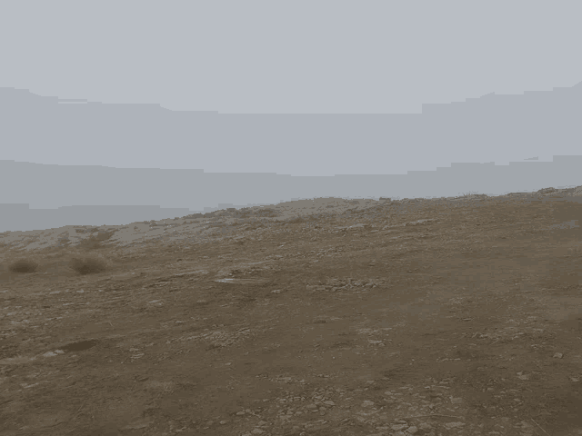 a rocky hillside with a white sky behind it