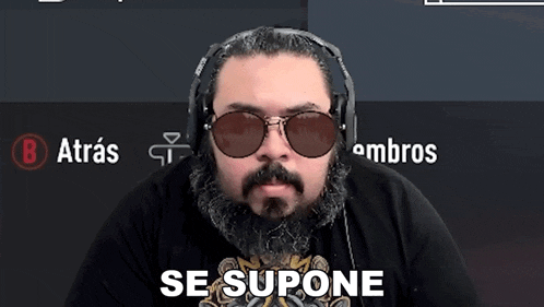 a man wearing headphones and sunglasses says se supone