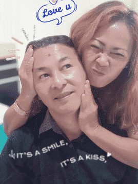 a man and a woman are posing for a picture with a speech bubble saying love u