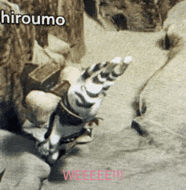 a close up of a person 's hand with the words " hiroumo weeeee " on the bottom