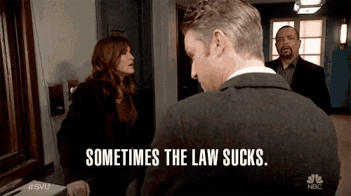 a man says sometimes the law sucks in front of a woman