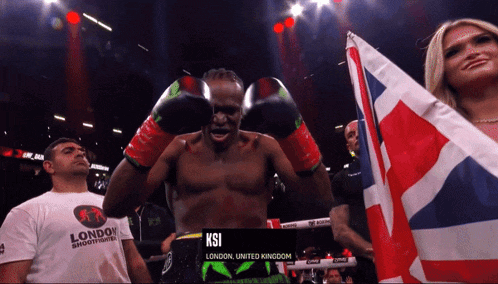 a man in boxing gloves holds a british flag and says ksi london united kingdom on the bottom