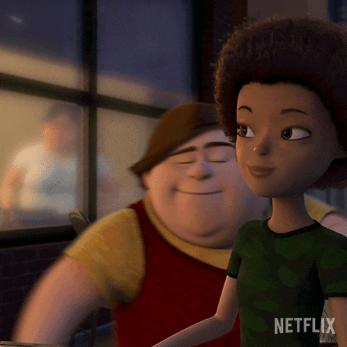 a man and a girl are standing next to each other and the girl is wearing a netflix shirt