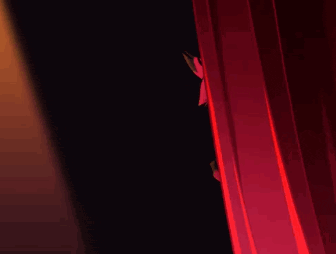 a cartoon character is standing behind a red curtain and giving a middle finger .