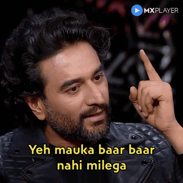 a man with a beard is pointing up with the words yeh mauka baar baar nahi milega below him